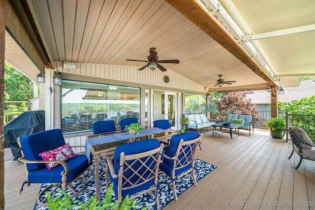 wooden deck with outdoor lounge area