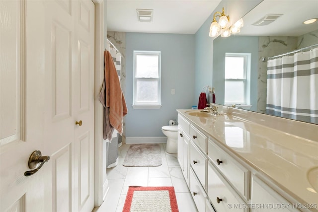 bathroom with tile patterned floors, walk in shower, vanity, and toilet