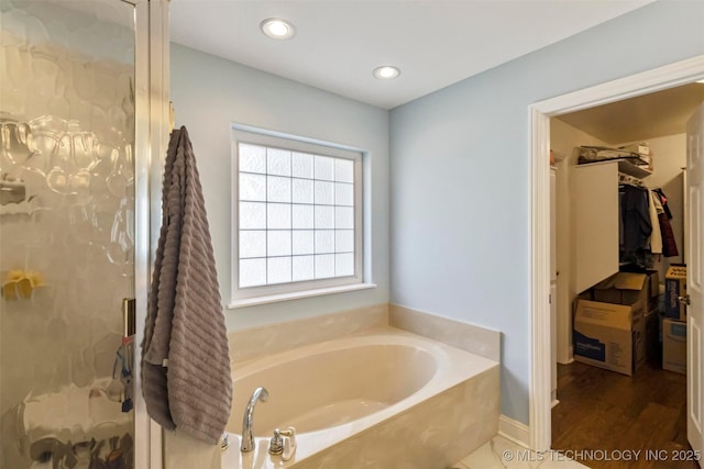 bathroom with a washtub