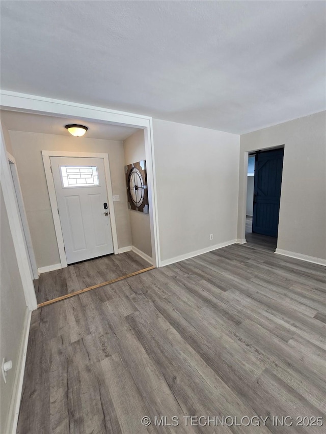 foyer with hardwood / wood-style floors