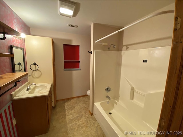 full bathroom with vanity, toilet, and tub / shower combination