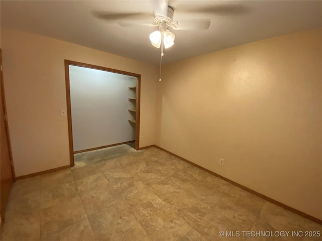 spare room featuring ceiling fan