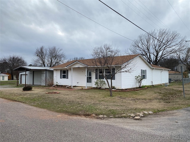 single story home with a front lawn and a garage