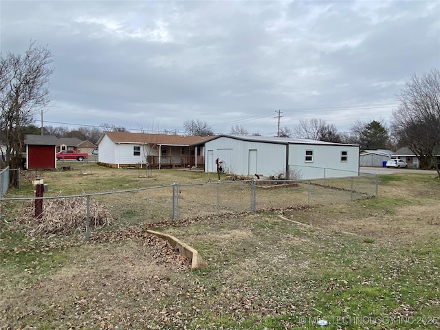 view of front of house featuring an outbuilding