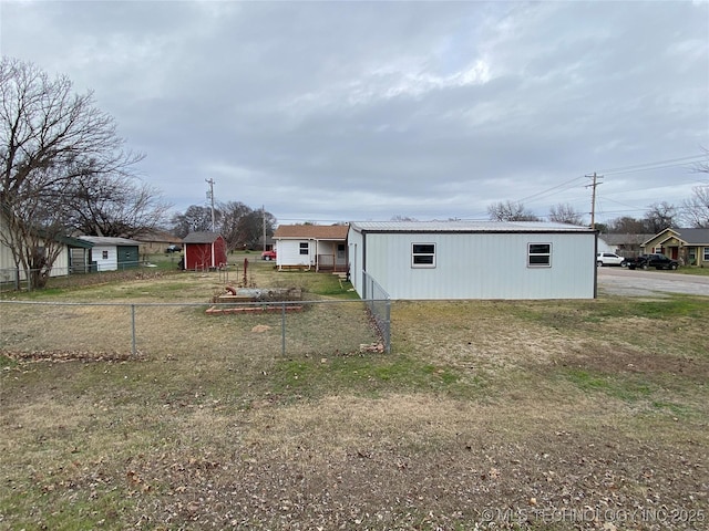 exterior space featuring an outbuilding