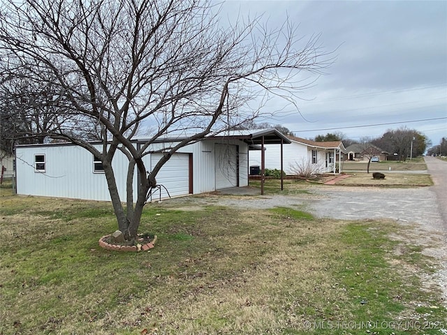 view of yard featuring a garage