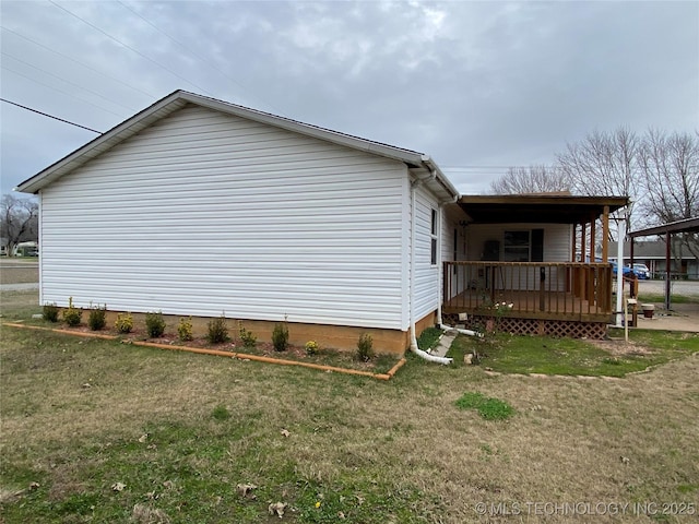 view of property exterior featuring a lawn