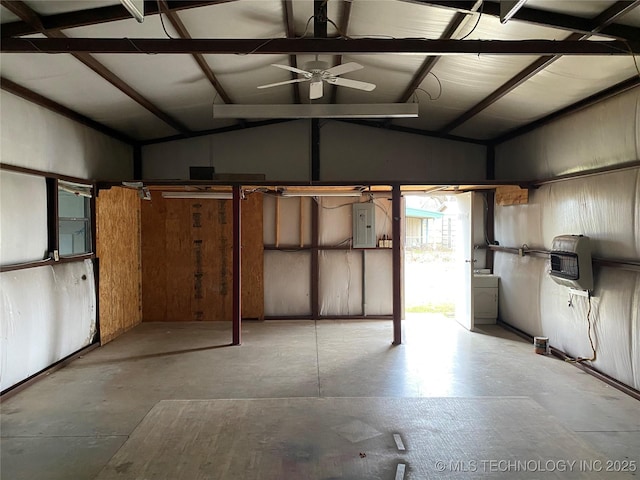 garage featuring electric panel, washer / clothes dryer, heating unit, and ceiling fan