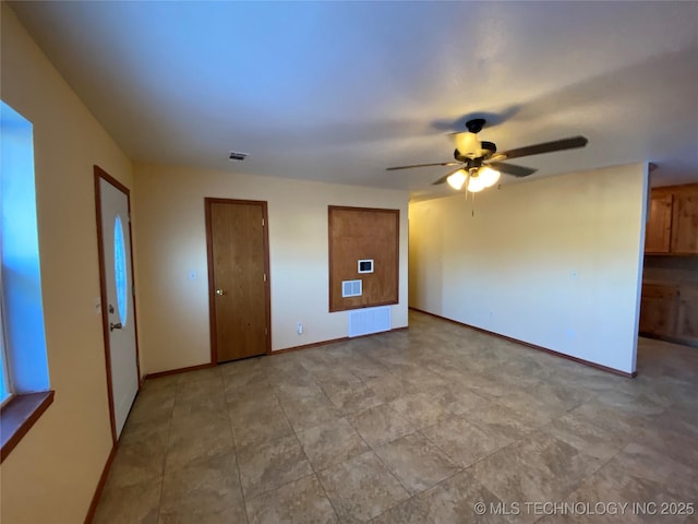 unfurnished room featuring ceiling fan