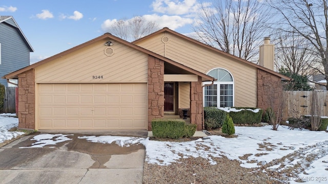 view of front of property featuring a garage