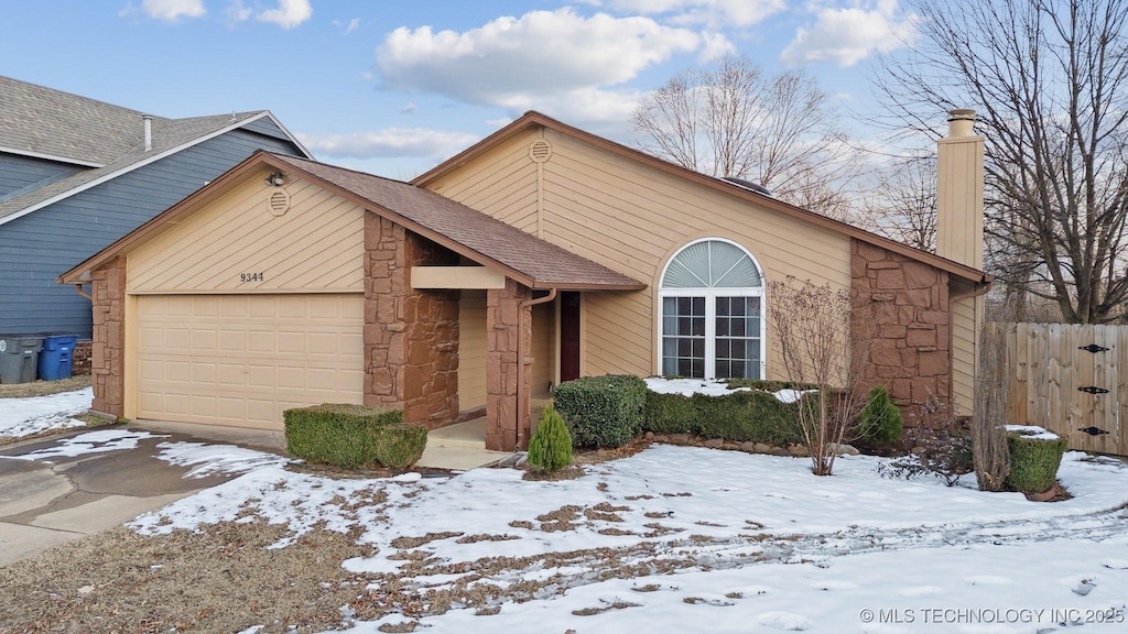 view of front of home with a garage