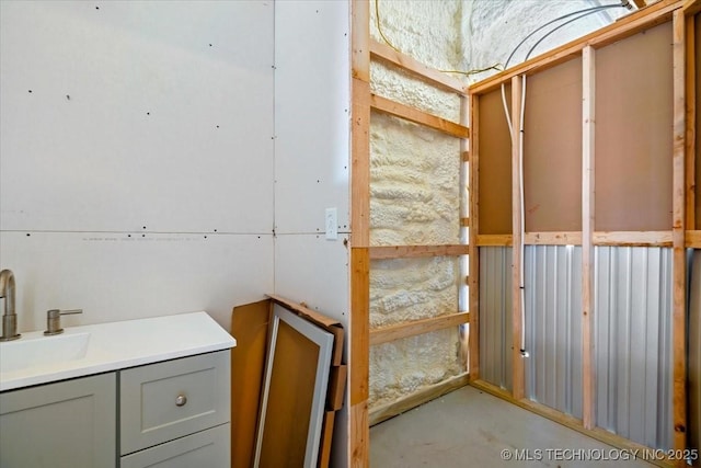 interior space with sink and concrete floors