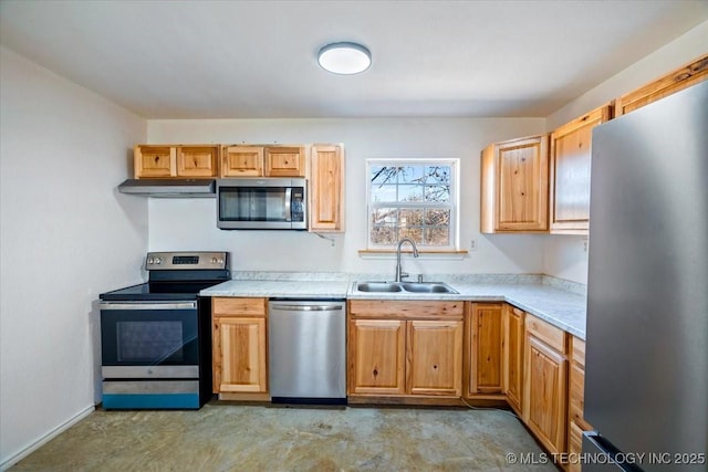 kitchen with sink and stainless steel appliances