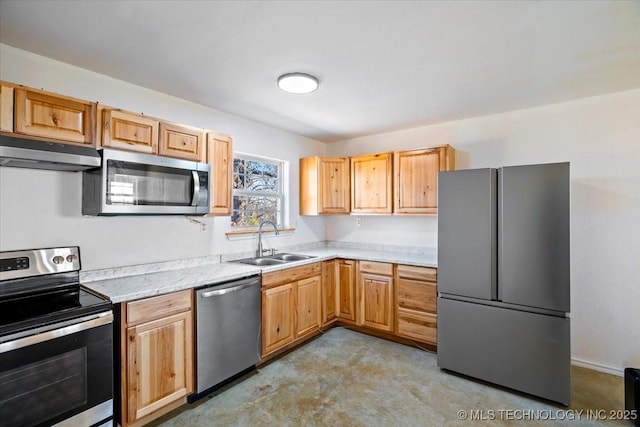 kitchen with sink and appliances with stainless steel finishes