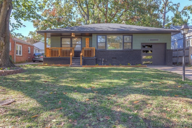 view of front facade featuring a front lawn and a garage