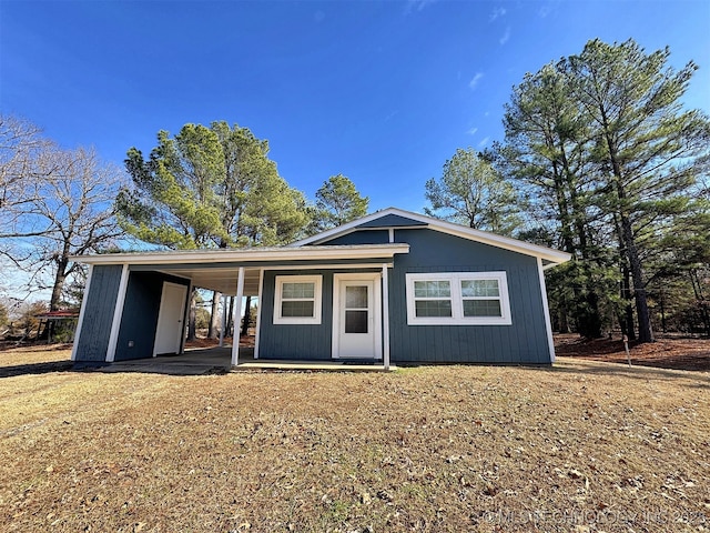 view of front of house featuring a carport