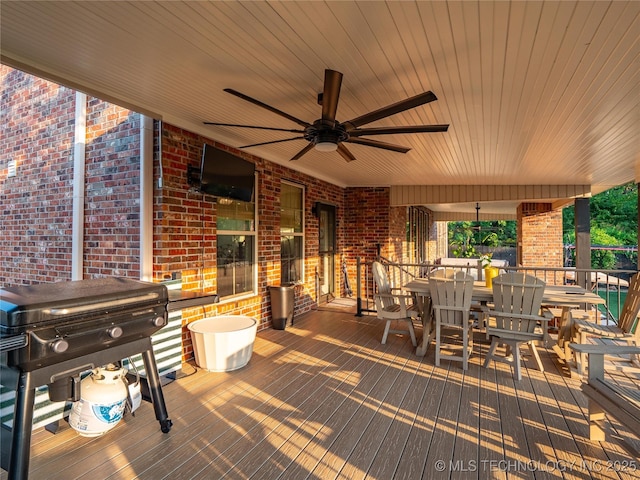 view of patio featuring area for grilling and ceiling fan