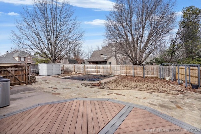 deck featuring a patio area and central AC unit