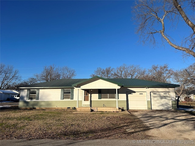 ranch-style house featuring a garage