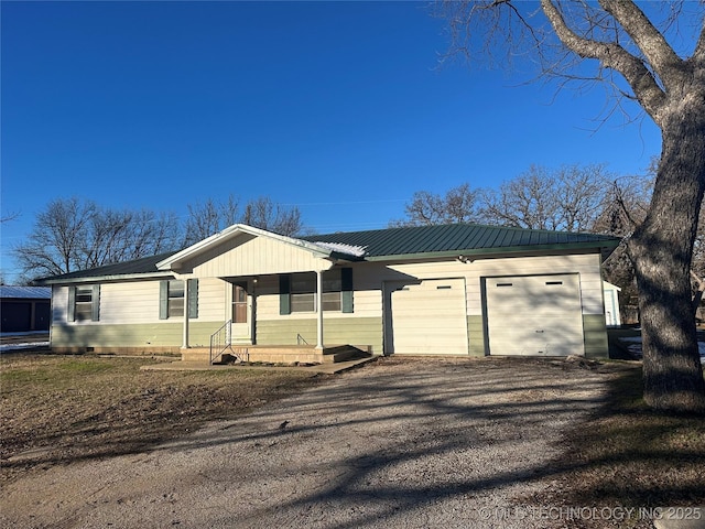 single story home featuring a garage