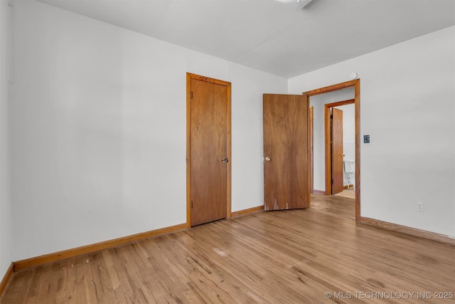 empty room with light wood-type flooring