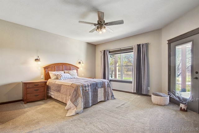 bedroom featuring light carpet and ceiling fan