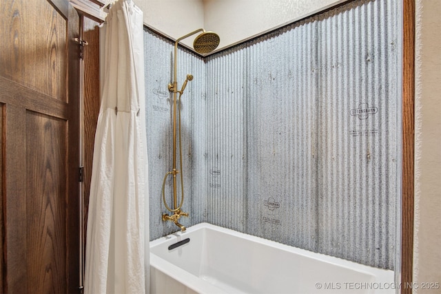 bathroom with shower / bathtub combination with curtain