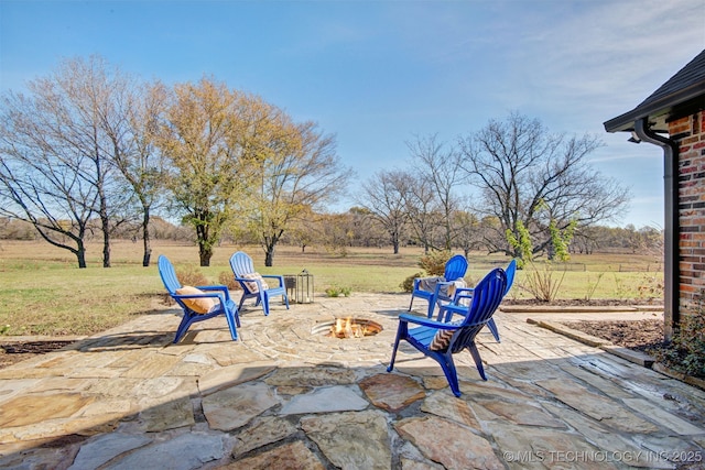 view of patio / terrace with a fire pit