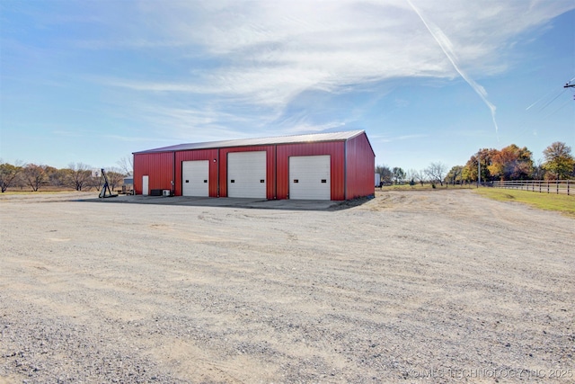 view of outbuilding with a garage