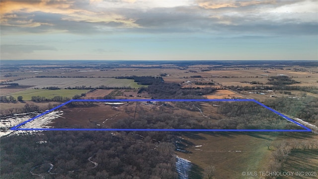 aerial view at dusk with a rural view