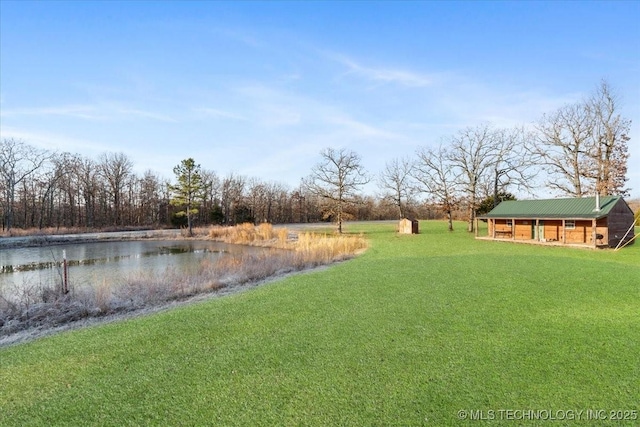 view of yard with a water view