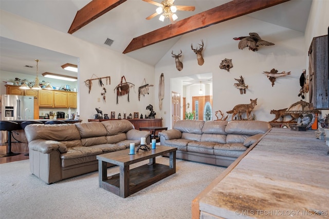 living room featuring beam ceiling, high vaulted ceiling, and ceiling fan