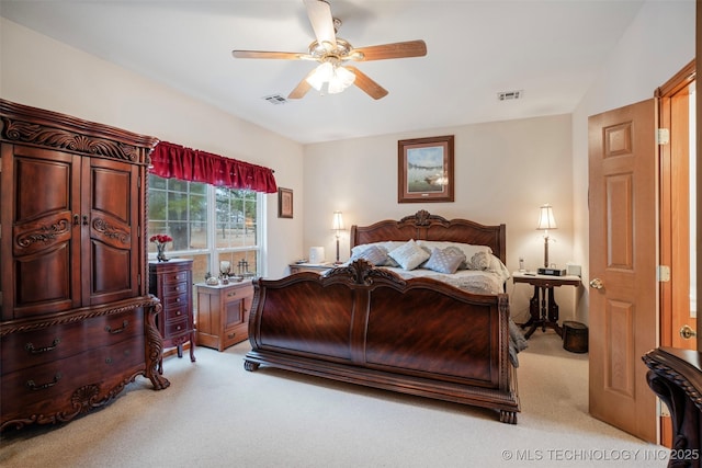 bedroom featuring light colored carpet and ceiling fan