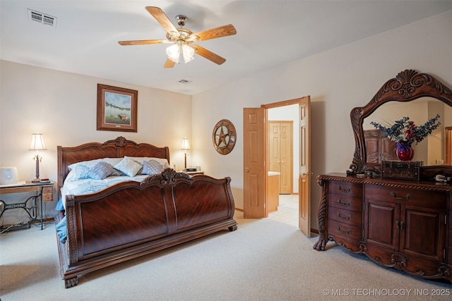 carpeted bedroom with ceiling fan