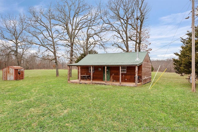 view of outdoor structure featuring a yard