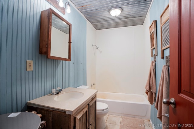 bathroom with vanity, tile patterned flooring, and toilet