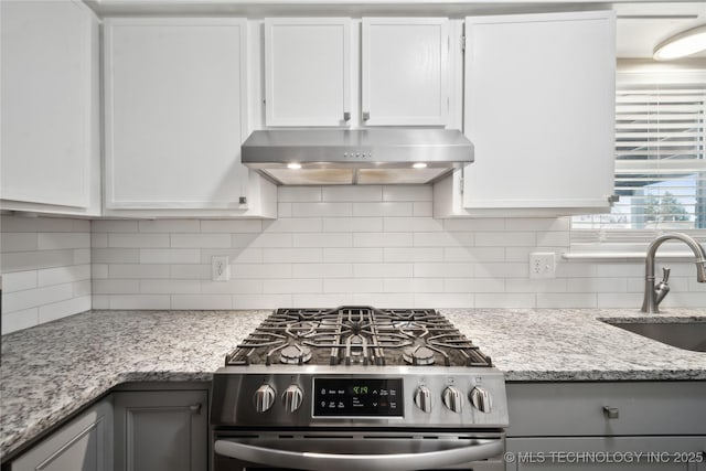 kitchen with sink, white cabinetry, and stainless steel range with gas stovetop