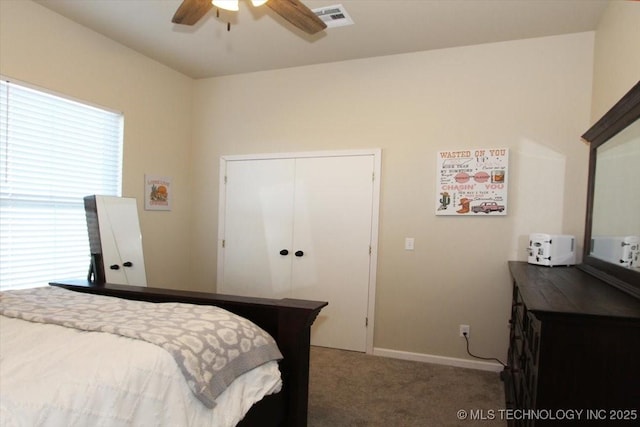 bedroom with carpet floors, a closet, and ceiling fan