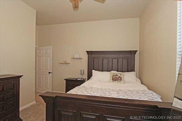 bedroom featuring ceiling fan and light colored carpet