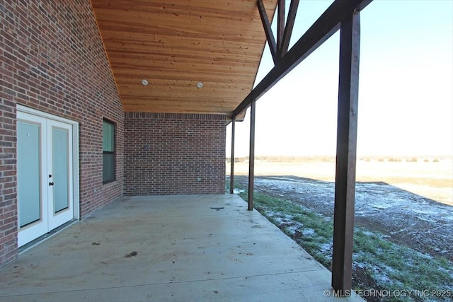 view of patio featuring french doors