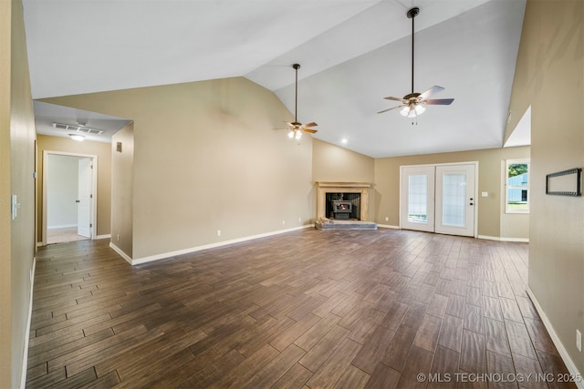 unfurnished living room featuring ceiling fan and lofted ceiling