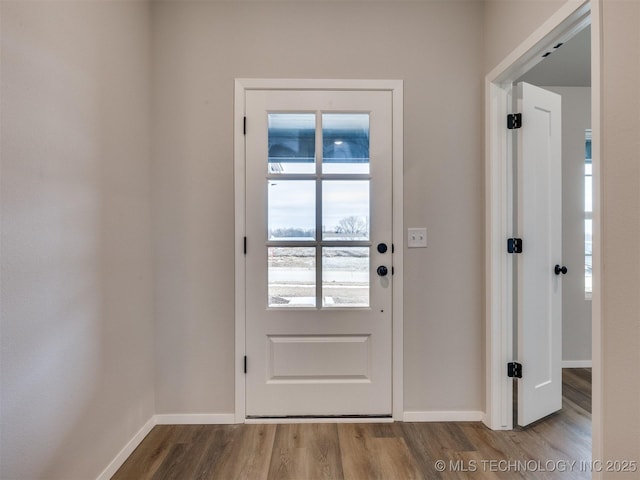 entryway with light hardwood / wood-style floors