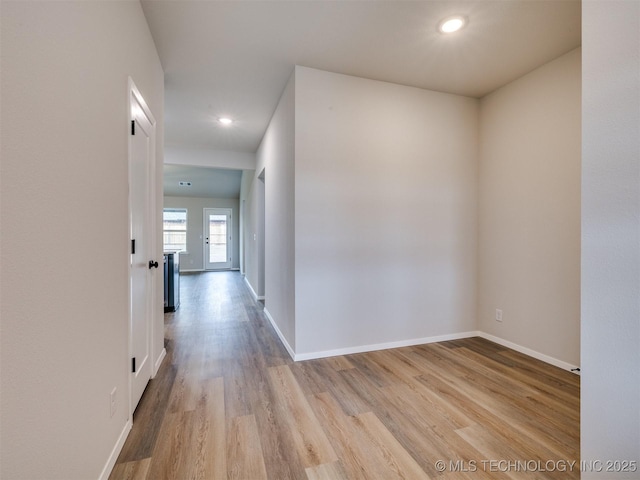 hallway featuring light hardwood / wood-style floors