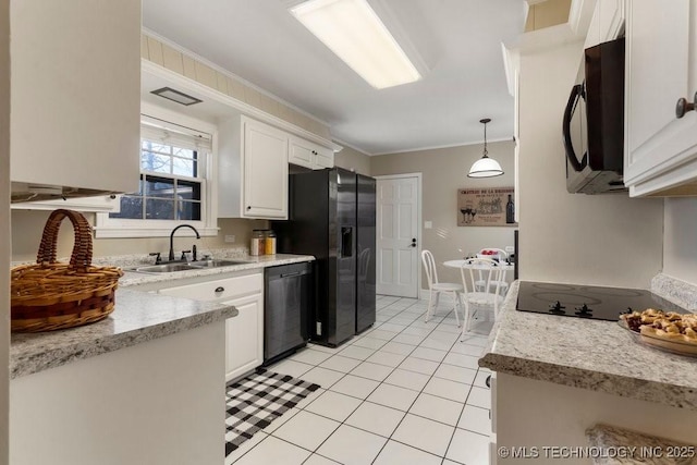 kitchen featuring black appliances, white cabinets, sink, hanging light fixtures, and ornamental molding