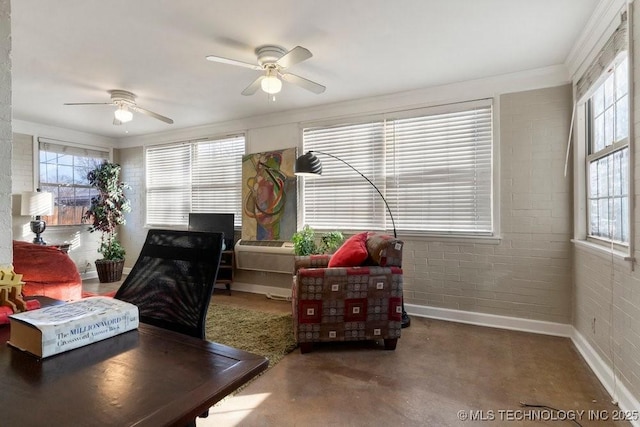 office with ceiling fan, brick wall, and ornamental molding