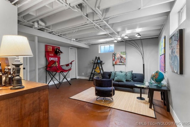 living room featuring concrete flooring