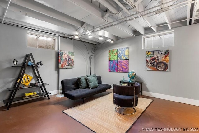 living room with concrete flooring