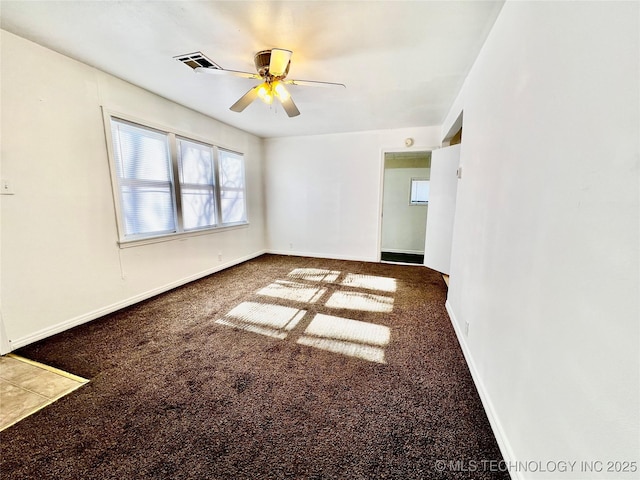 empty room with carpet flooring and ceiling fan