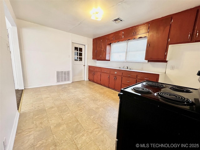 kitchen featuring electric range