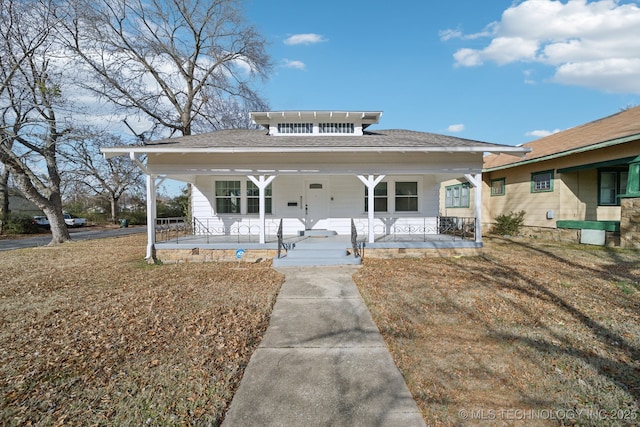 view of front of property featuring covered porch